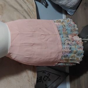 Pink skirt with pleated trim
